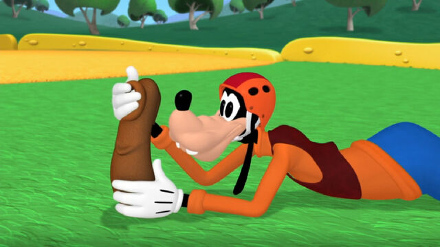 File:Goofy caught the toy marcher with his shoe.jpg