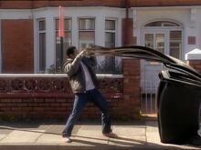 Mickey is attacked by a bin.jpg