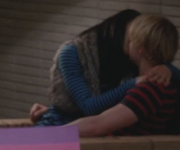 Sam & Santana kiss.png