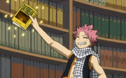 Natsu trouve le livre