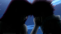Erza comforting Natsu
