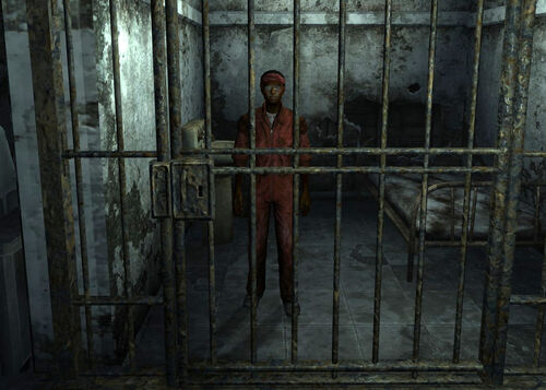 File:Redbehindbars.jpg