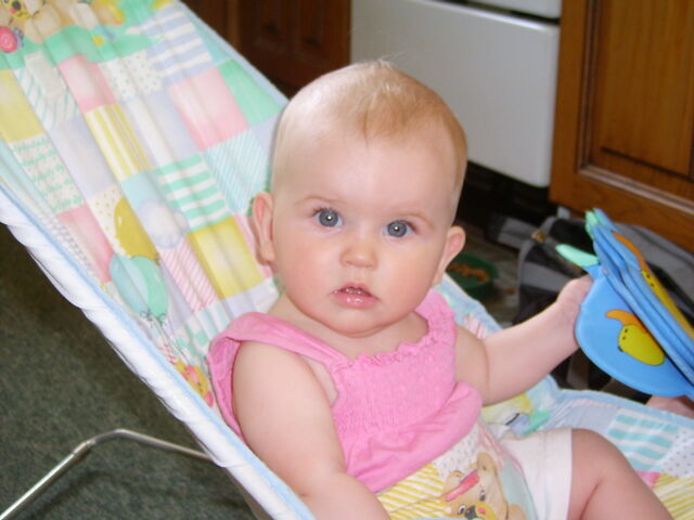 File:Sitting-in-bouncer-chair-5-five-month-stella-in-pink-summer-top-2-JR.jpg