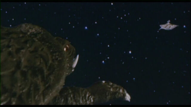 File:Gamera flies toward Zanon.jpg