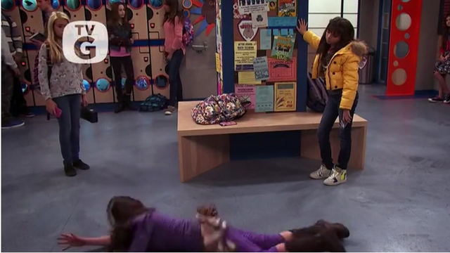 File:Babe looking at Kenzie rolling around the floor.png