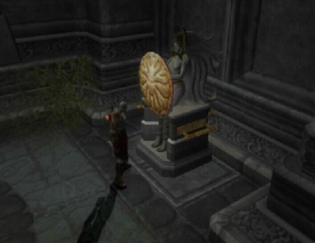 File:8-statuewithshield.jpg