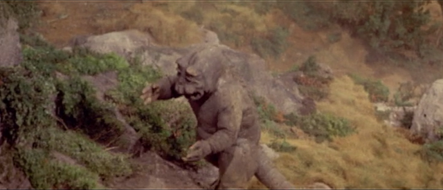 File:All Monsters Attack - Minilla walks up to Ichiro.png