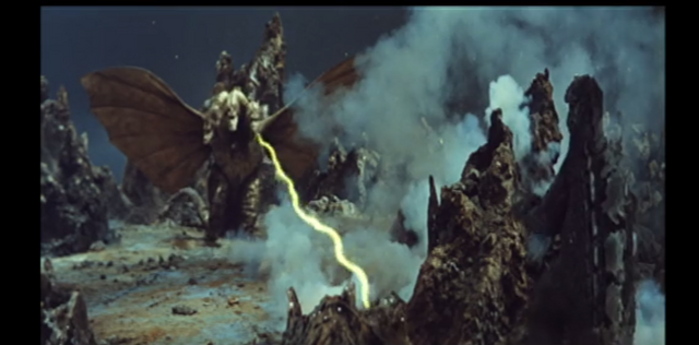 File:Goji hides behind a rock.png