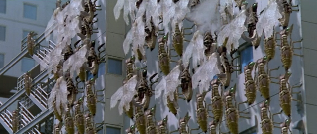 File:Godzilla vs. Megaguirus - Hundreds of Meganulas molt their skin.png