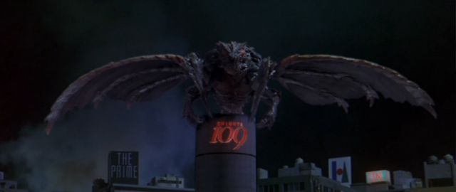 File:Godzilla vs. Megaguirus - Megaguirus rests atop the Shiesta 109 building.png