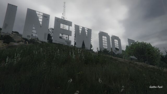 File:VinewoodSign-GTAV-CloudySky.jpg