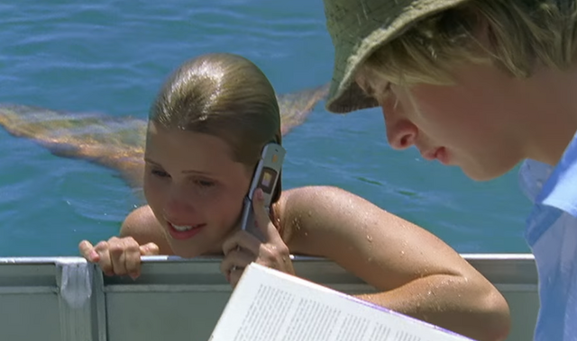 File:Emma on Phone.png