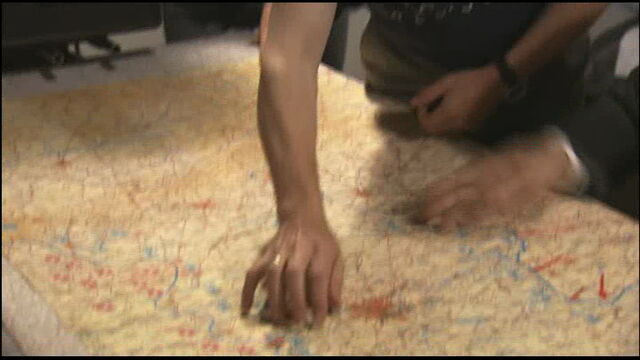 File:Rainer Klausmann map pointing.jpg