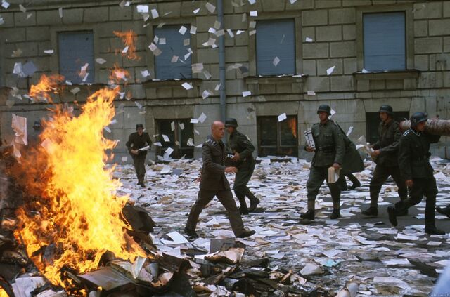 File:Schenck walks paper burning.jpg