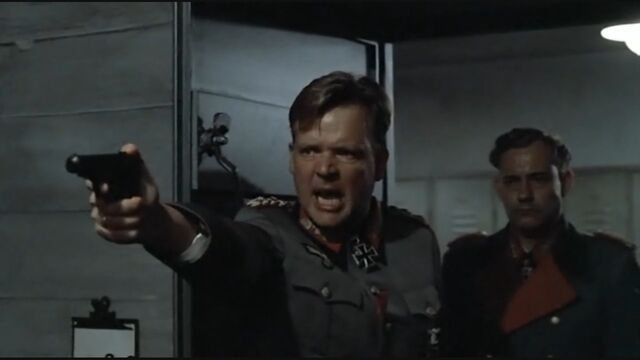File:Burgdorf aims pistol.jpg