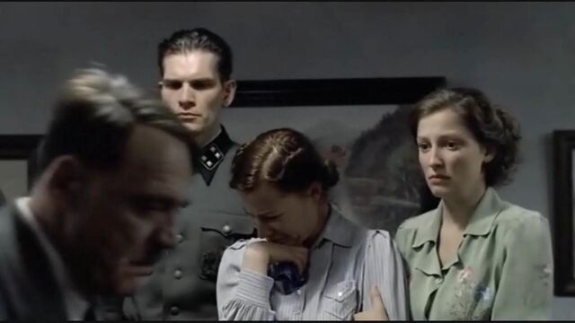 File:Hitler walks by Traudl.jpg