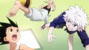 Gon y Killua intentando robar la pelota de Netero