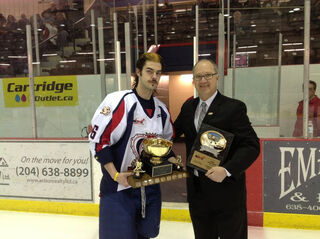 Jesse Sinatynski receives Mike Ridley Trophy