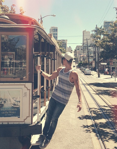 File:Austin Holding onto Bus.png