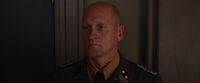 Bald German security guard
