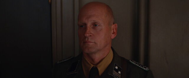 File:Bald German security guard.jpg