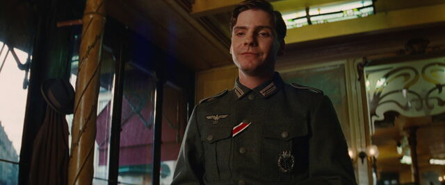 File:Zoller looks at Shosanna in the bistro.jpg