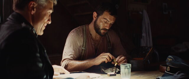 File:Perrier LaPadite fills his pipe.jpg