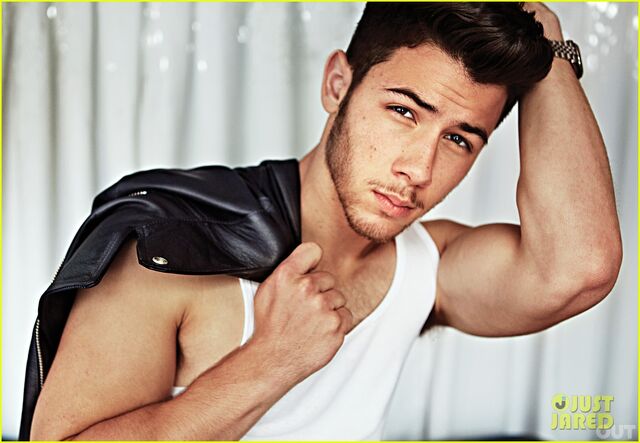 File:Nick-jonas-shows-off-huge-muscles-for-jonas-brothers-out-feature-01.jpg
