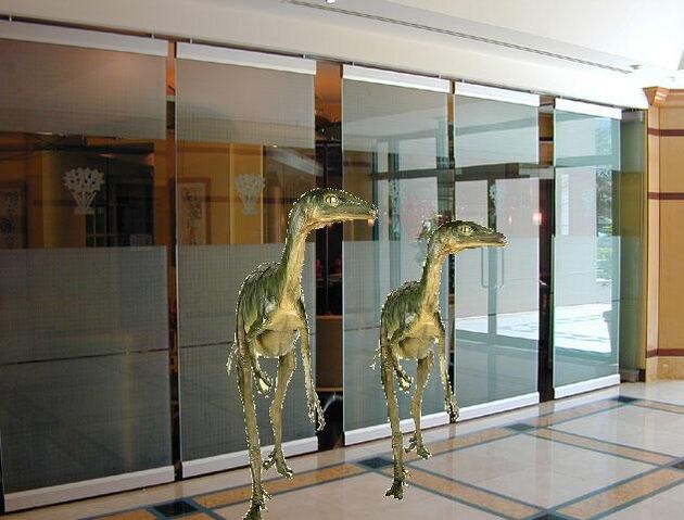 File:Troodons in office.jpg