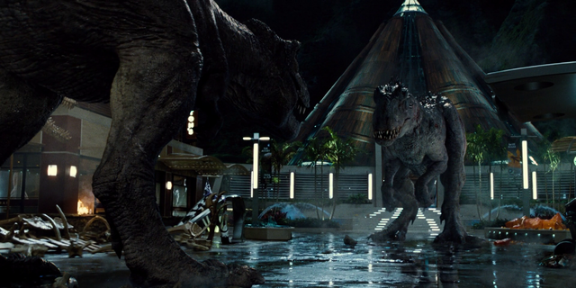 File:T-rexvsIndominus.png