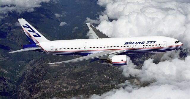 File:Boeing 777 above clouds, crop.jpg