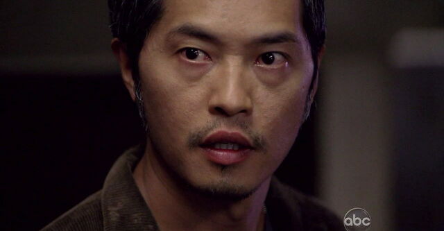 File:5x13 MilesLooksOn.jpg