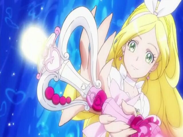 File:Suite Pretty Cure Cure Rhythm with her Fantastic Belltier Cross Rod.jpg