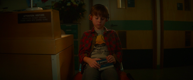 File:YoungPeterQuilllistingtohiswalkmen.png