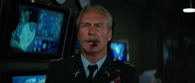 File:GeneralRoss-WatchesTheNews.jpg