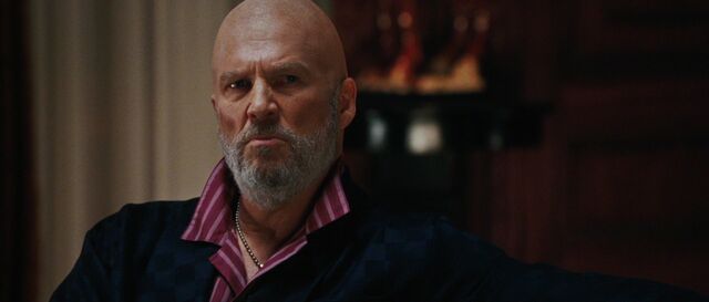 File:Obadiah-Stane-watches-the-news.jpg