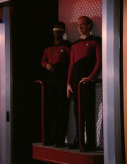 La Forge and Remmick using an elevator