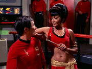 Uhura distracts Hikaru Sulu (mirror).jpg