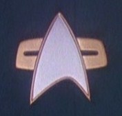 Starfleet combadge, 2370s.jpg