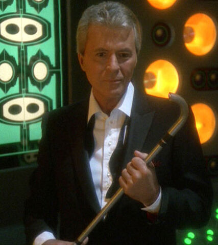 File:Vic Fontaine holding a cane.jpg