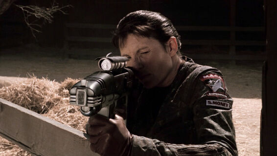 File:S Money aiming a particle rifle.jpg