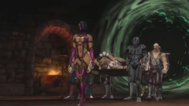File:Motaro body is brought to Shao Kahn.jpg
