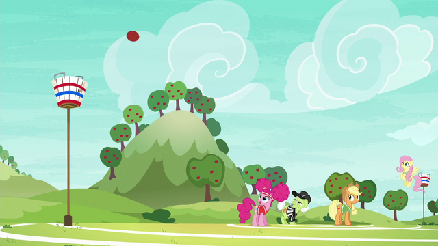 File:Applejack sends the ball flying S6E18.png
