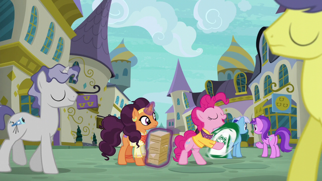 File:Pinkie Pie starts sign spinning S6E12.png