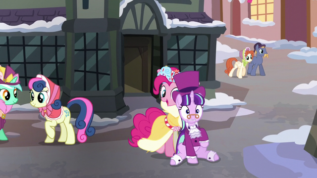 File:Spirit of HW Presents pushing Snowfall out of the house S6E8.png