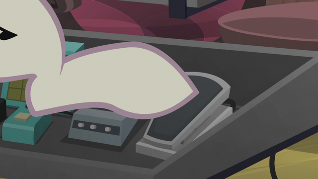 File:DJ Pon-3 pressing down an effects pedal S5E9.png