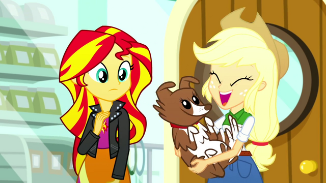 File:Applejack happily holding Winona SS7.png