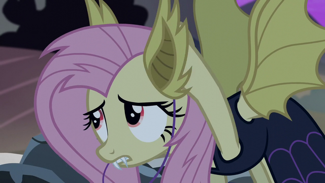 File:Fluttershy taking off her bat ears S5E21.png