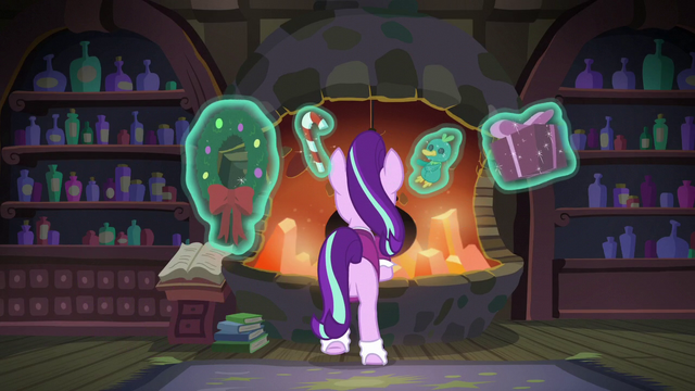 File:Snowfall stands in front of her cauldron S06E08.png