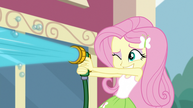 File:Fluttershy spraying water from a hose EGS1.png